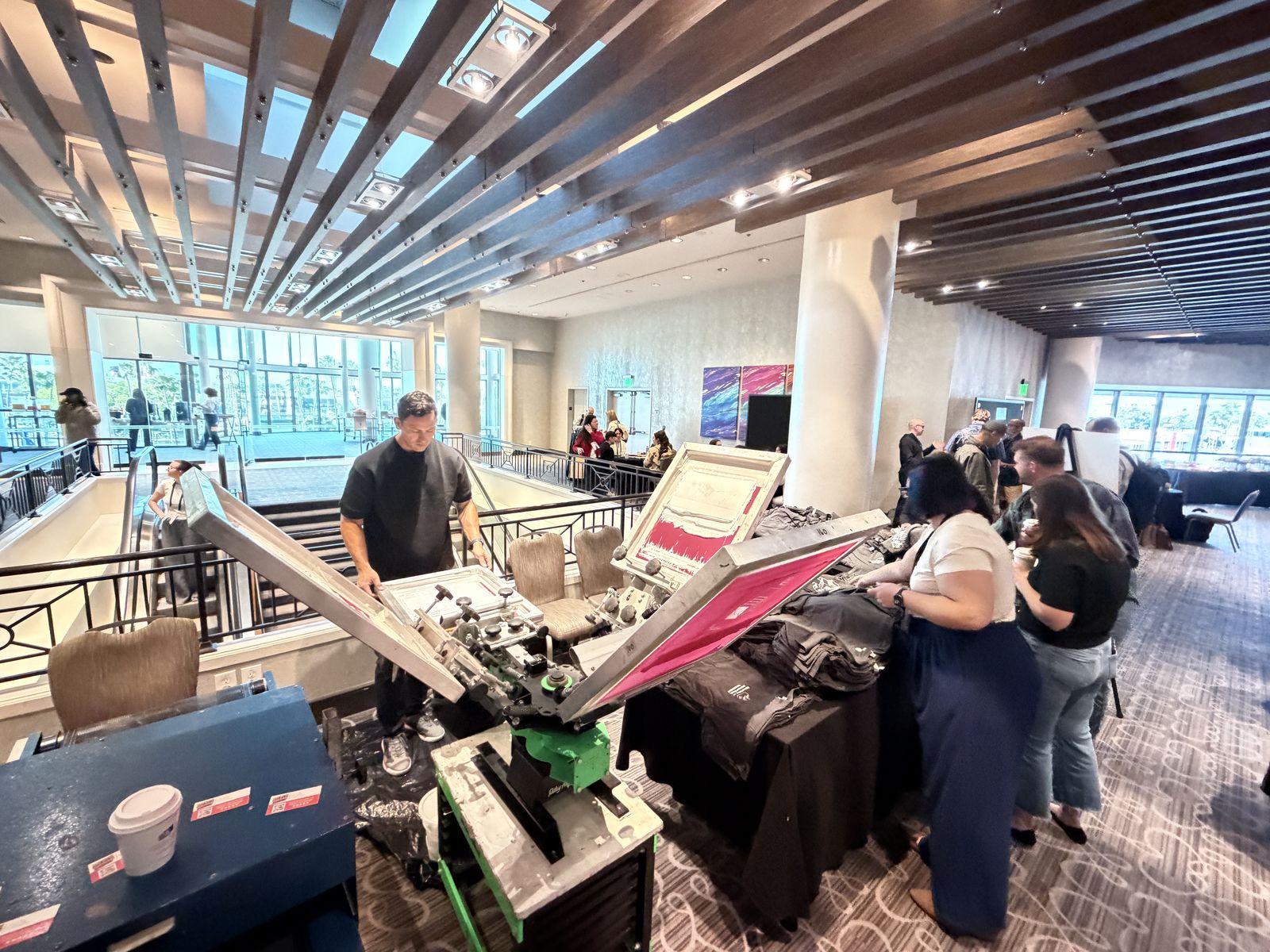 Merch Troop live screen-printing station running at a Indianapolis event